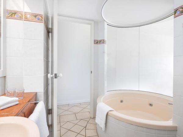 BreakFree Royal Harbour : photo 1 de la chambre appartement 1 chambre - vue sur jardin