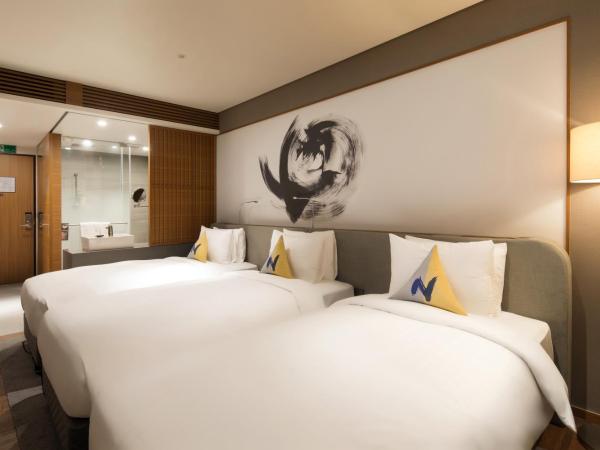Novotel Ambassador Seoul Dongdaemun Hotels & Residences : photo 4 de la chambre chambre triple supérieure avec 3 lits simples
