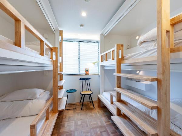 plat hostel keikyu haneda home : photo 1 de la chambre chambre quadruple avec salle de bains commune