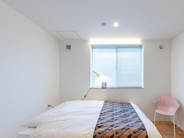 plat hostel keikyu haneda home : photo 5 de la chambre chambre double avec salle de bains commune