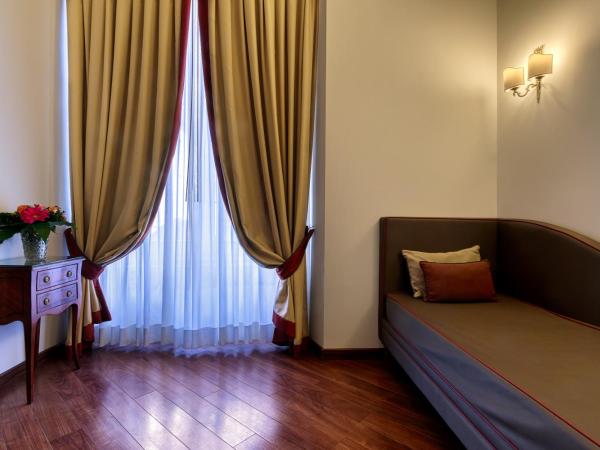 Decumani Hotel De Charme : photo 6 de la chambre chambre triple supérieure