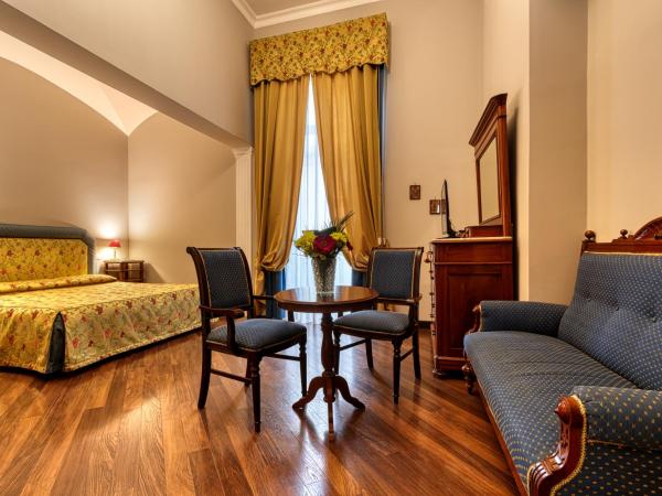 Decumani Hotel De Charme : photo 5 de la chambre chambre double ou lits jumeaux supérieure