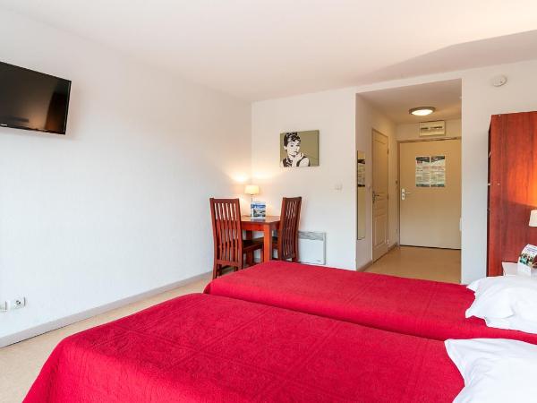 Vacancéole - Résidence Le Saint Clair : photo 3 de la chambre chambre lits jumeaux