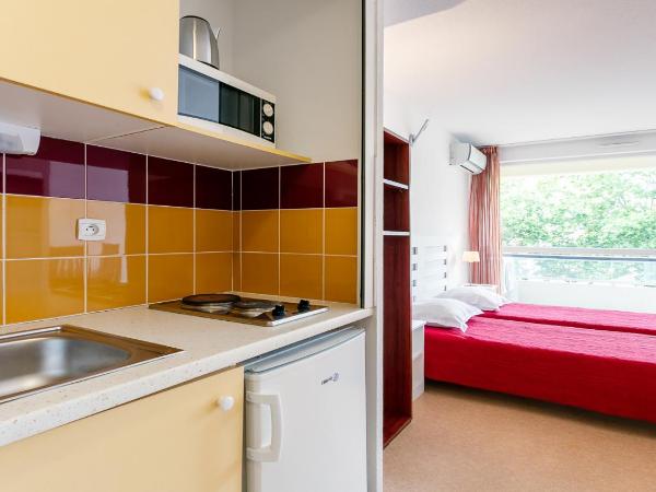 Vacancéole - Résidence Le Saint Clair : photo 1 de la chambre chambre lits jumeaux