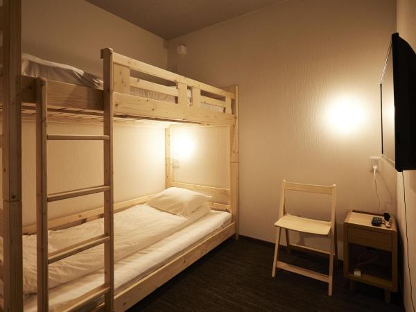 HOTEL THE ROCK : photo 2 de la chambre chambre lits jumeaux avec lit superposé