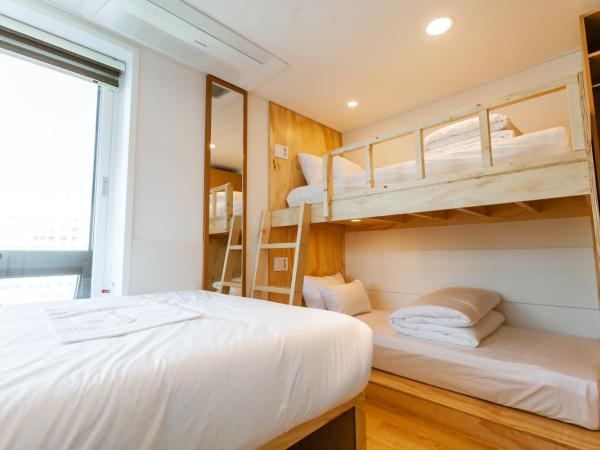 Seoulite Inn Myeongdong Formerly - Step Inn Myeongdong 2 : photo 4 de la chambre chambre familiale - vue sur ville 