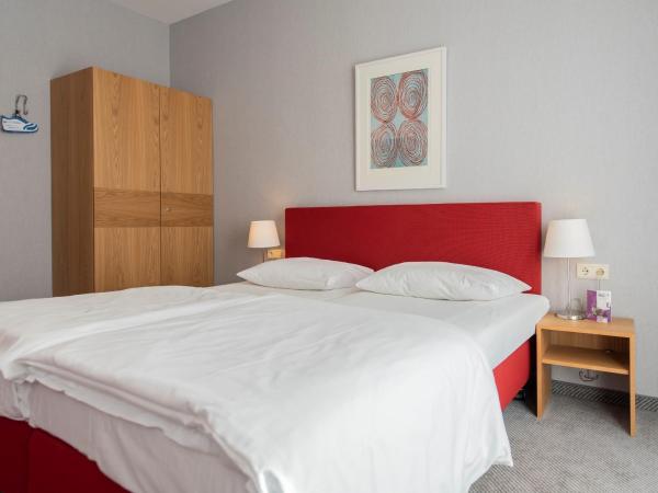 Hotel Aigner : photo 1 de la chambre chambre triple