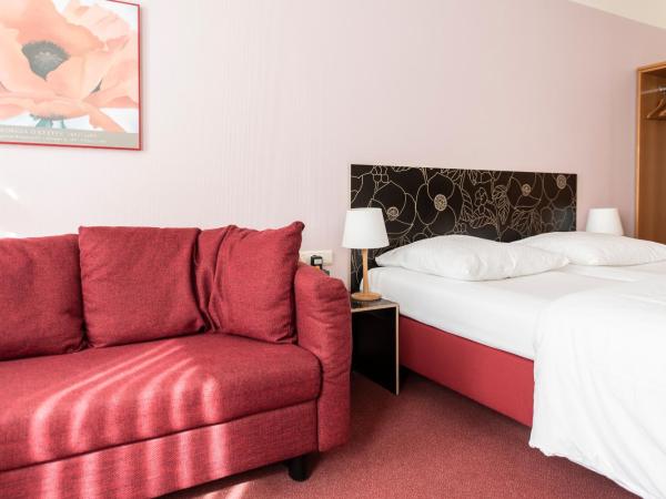 Hotel Aigner : photo 1 de la chambre chambre familiale