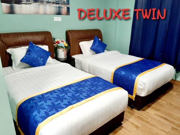 GOOD 9 HOTEL - Bukit Dahlia : photo 1 de la chambre chambre lits jumeaux deluxe