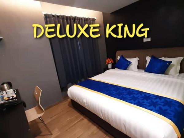 GOOD 9 HOTEL - Bukit Dahlia : photo 4 de la chambre chambre lit king-size deluxe