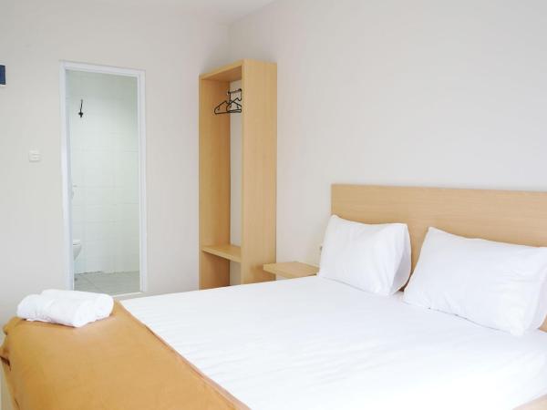 UROOMS Senayan : photo 3 de la chambre chambre double standard