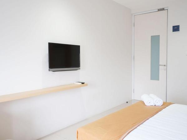 UROOMS Senayan : photo 4 de la chambre chambre double standard