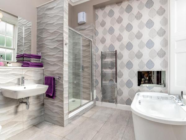 Haymarket Apartments : photo 4 de la chambre suite lit king-size