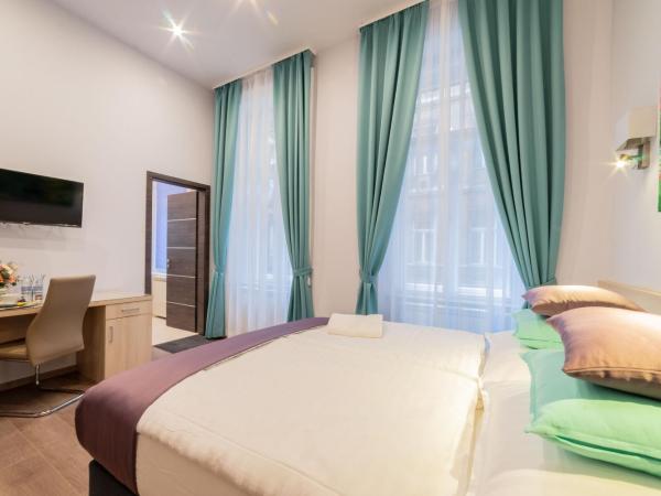 Global Suites Budapest : photo 1 de la chambre chambre deluxe double ou lits jumeaux