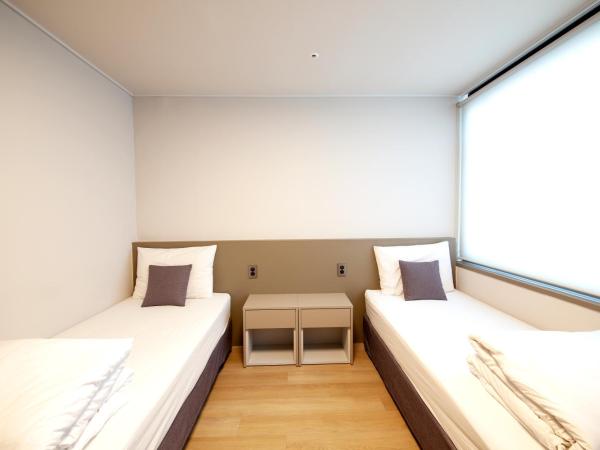 K-Grand Hostel Dongdaemun : photo 1 de la chambre chambre lits jumeaux standard