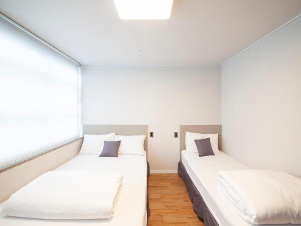 K-Grand Hostel Dongdaemun : photo 1 de la chambre chambre triple standard