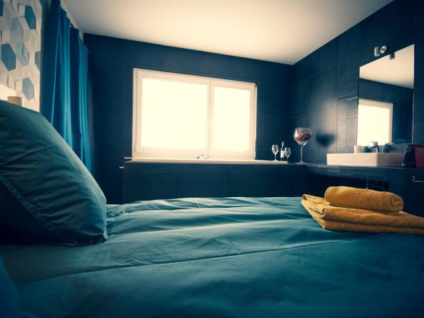 Chambre d'hôte Valère : photo 5 de la chambre chambre lit king-size deluxe