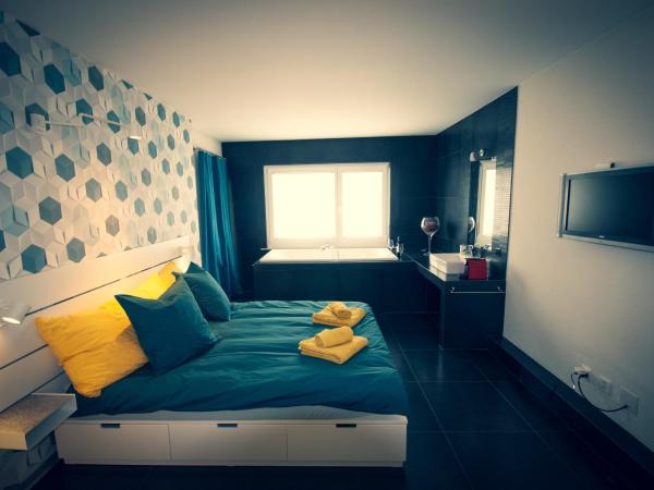 Chambre d'hôte Valère : photo 4 de la chambre chambre lit king-size deluxe