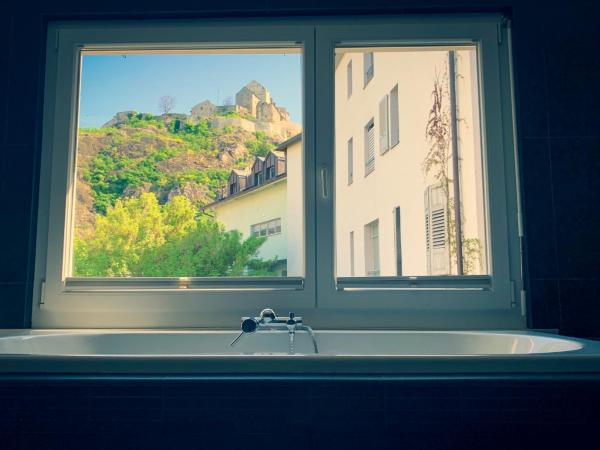 Chambre d'hôte Valère : photo 10 de la chambre chambre lit king-size deluxe