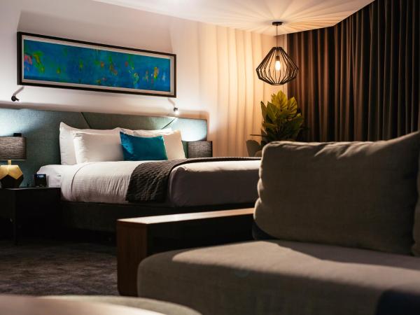 Eatons Hill Hotel : photo 1 de la chambre suite lit king-size