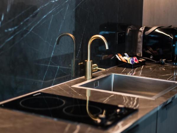 Eatons Hill Hotel : photo 7 de la chambre suite lit king-size