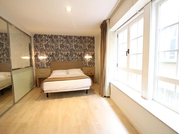 Hotel Alda San Carlos : photo 1 de la chambre chambre familiale