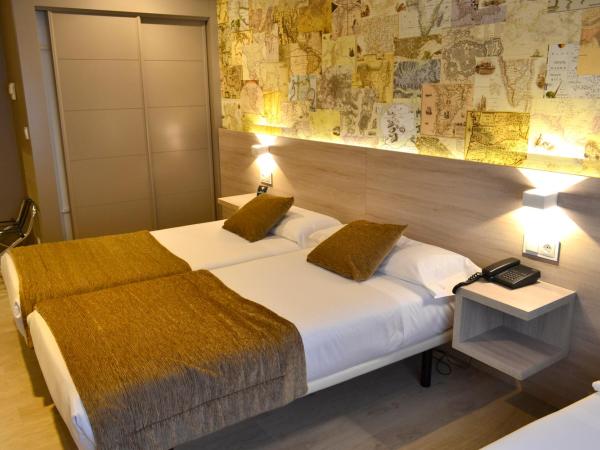 Hotel Alda San Carlos : photo 3 de la chambre chambre lits jumeaux avec lit d'appoint (3 adultes)