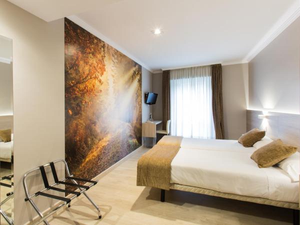 Hotel Alda San Carlos : photo 1 de la chambre chambre lits jumeaux supérieure