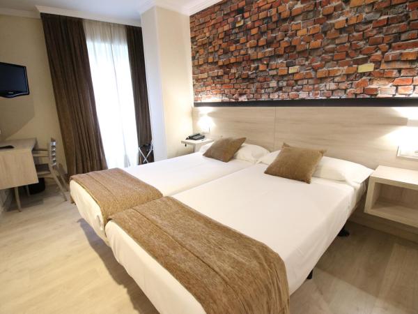 Hotel Alda San Carlos : photo 4 de la chambre chambre double ou lits jumeaux