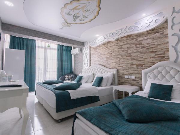 Pamukkale Melrose Viewpoint Suites : photo 6 de la chambre chambre triple