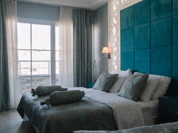 Pamukkale Melrose Viewpoint Suites : photo 2 de la chambre chambre triple confort - vue sur travertin
