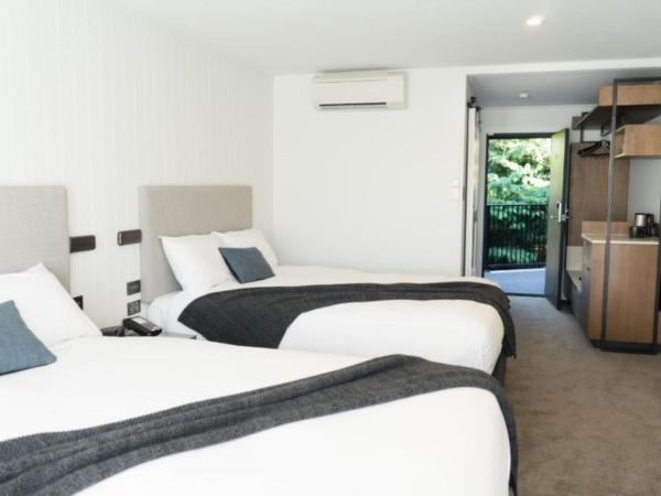 Kamana Lakehouse : photo 2 de la chambre chambre lits jumeaux avec 2 lits queen-size - kamana - vue sur cour