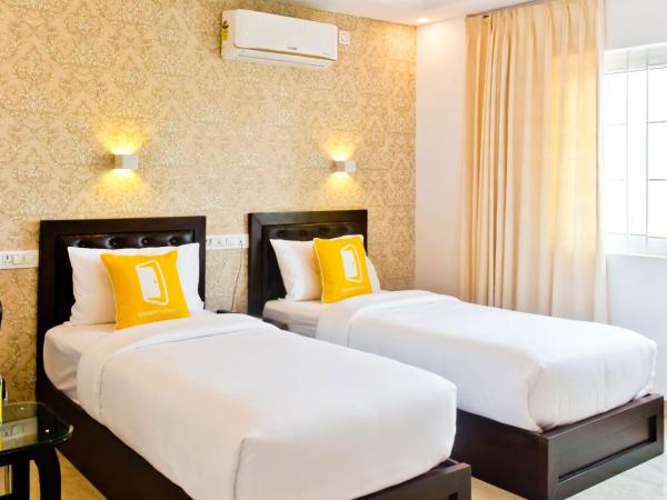 X by Bloom l Indiranagar : photo 1 de la chambre chambre lits jumeaux deluxe