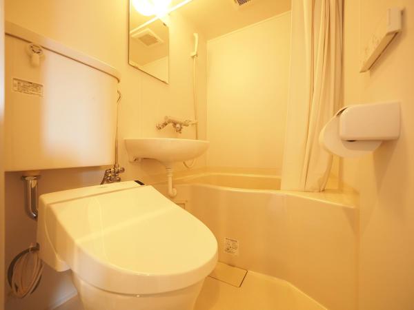 Family Tree Guest House : photo 1 de la chambre chambre quadruple avec salle de bains