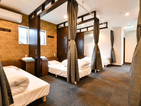 Samurai Stay Sugamo-Male Only : photo 3 de la chambre lit simple dans dortoir pour hommes