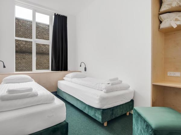 Sleepcph : photo 1 de la chambre chambre double ou lits jumeaux avec salle de bains commune