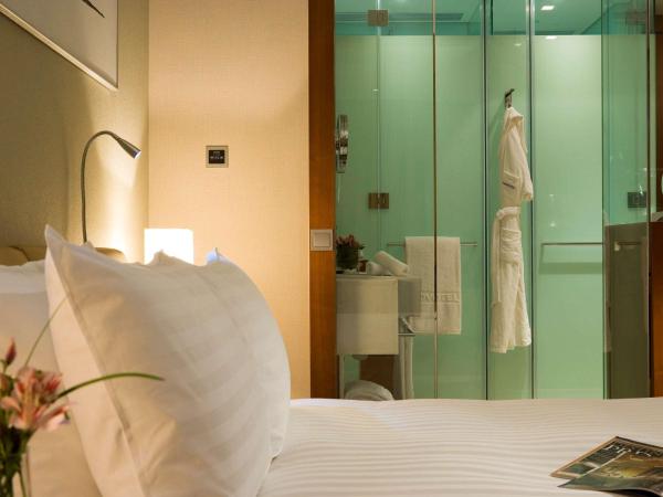 Novotel Citygate Hong Kong : photo 1 de la chambre family room with queen bed and two single beds