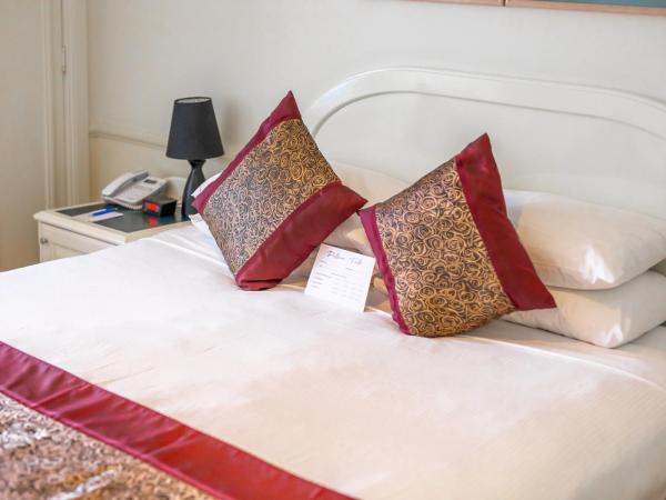 Twin Towers Inn : photo 3 de la chambre chambre standard lit queen-size