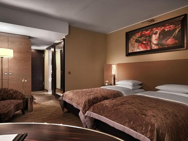 Hyatt Regency Dusseldorf : photo 2 de la chambre chambre lits jumeaux - vue sur port