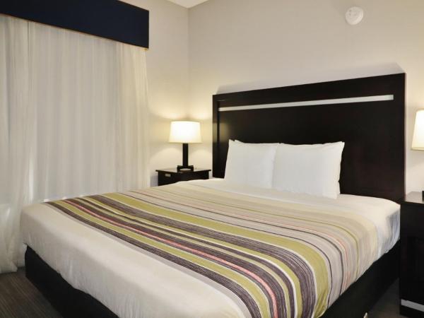 Country Inn & Suites by Radisson, Jacksonville, FL : photo 2 de la chambre suite 1 chambre lit king-size - non-fumeurs