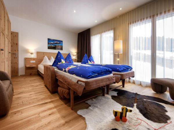 Golf- & Sporthotel Hof Maran : photo 1 de la chambre chambre familiale alpine