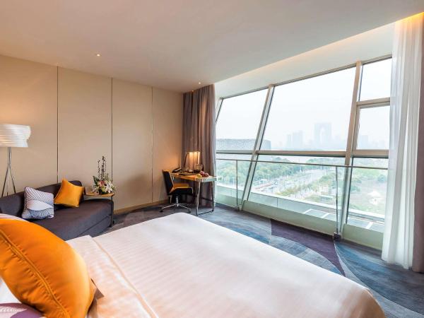 Novotel Suzhou Sip : photo 4 de la chambre chambre lit king-size premier