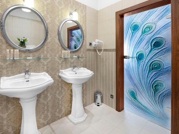 Ventus Rosa Boutique Aparthotel : photo 9 de la chambre chambre double ou lits jumeaux supérieure avec orangerie