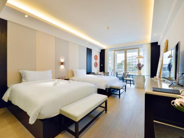 Palace Resort Yalong Bay Sanya : photo 3 de la chambre chambre lits jumeaux de luxe - vue sur piscine