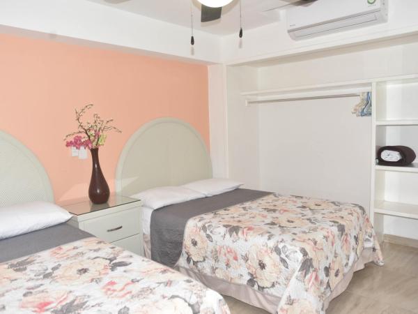 ENNA INN IXTAPA DEPARTAMENTOS ViSTA AL MAR : photo 4 de la chambre appartement supérieur