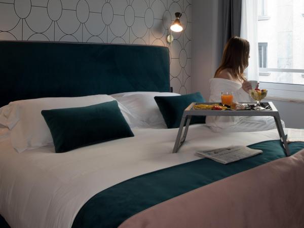 Duomo Hotel & Apartments : photo 2 de la chambre chambre lit king-size deluxe