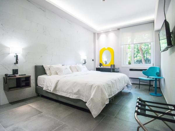 Palmyra Beach Hotel : photo 2 de la chambre chambre familiale - vue sur jardin