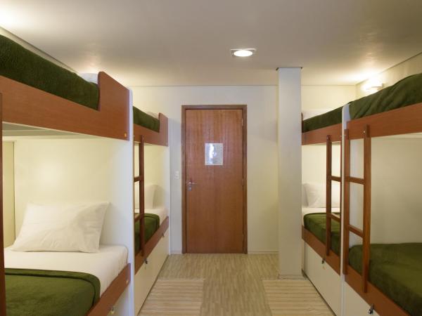 Brazilodge All Suites Hostel : photo 1 de la chambre lit simple dans dortoir pour hommes de 8 lits avec salle de bains privative