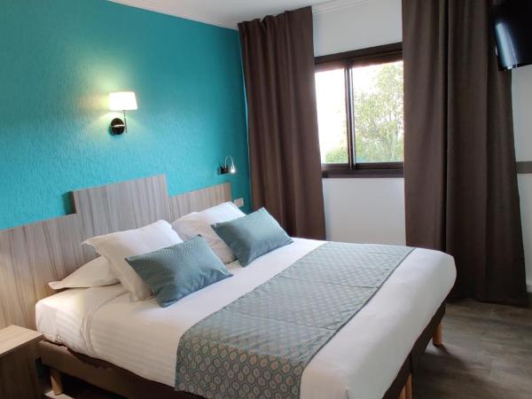 Logis Hôtel Les Bleuets : photo 4 de la chambre chambre double standard côté jardin