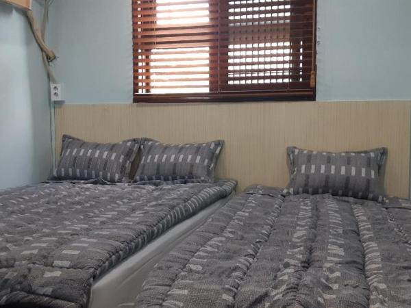 Kimstay 9 : photo 3 de la chambre chambre lits jumeaux deluxe